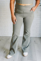 Building Habits Twill Flared Crossover Waist Pant in Dusty Olive-Bottoms-Stay Foxy Boutique, Florissant, Missouri